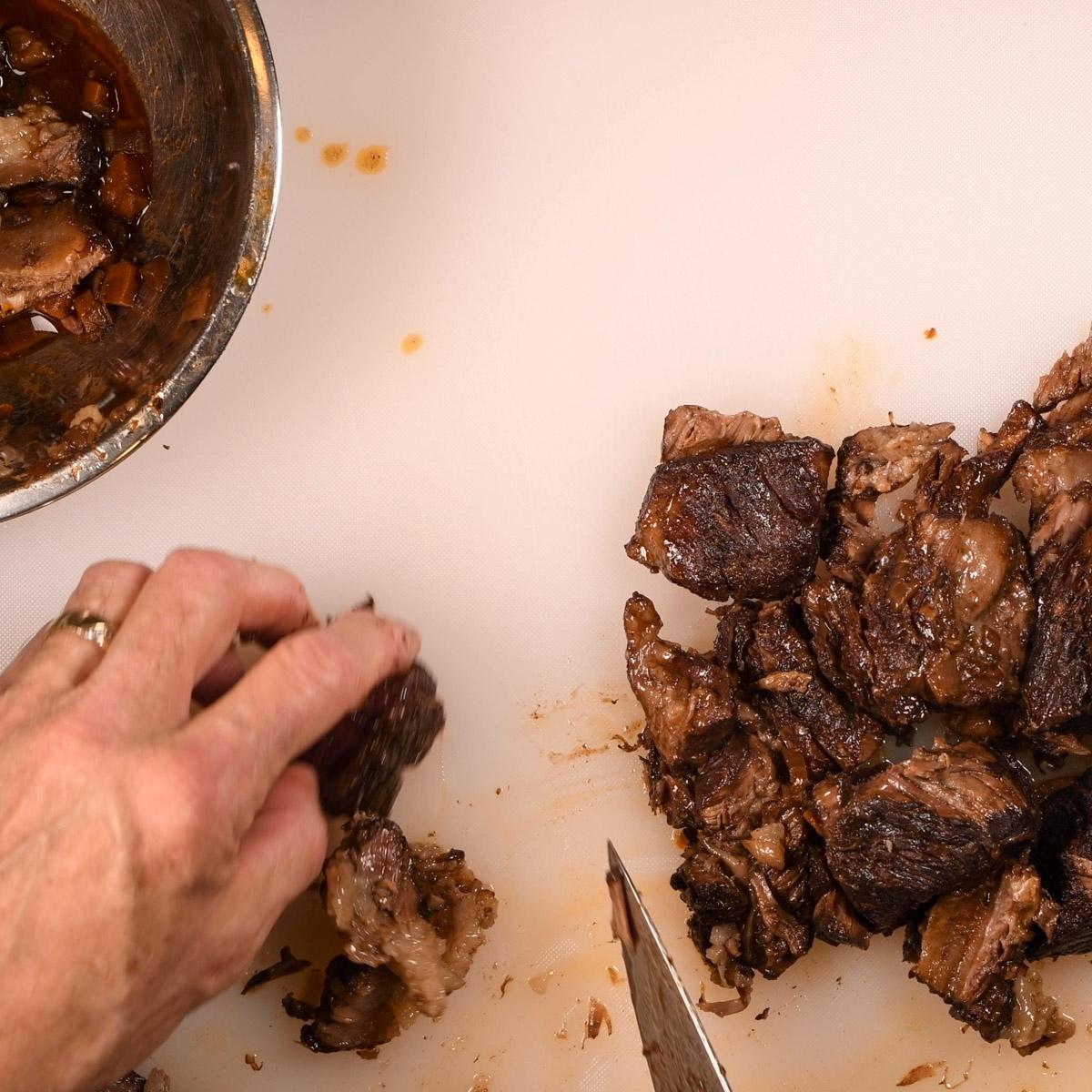 Trim the fat from braised gnocchi.