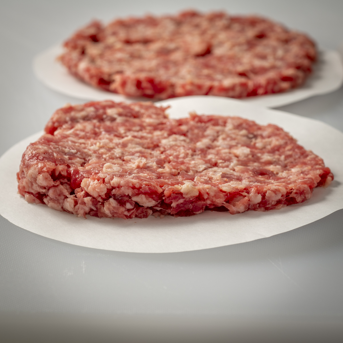 The lightest presses produced uneven patties that were noticeably thicker on one end.
