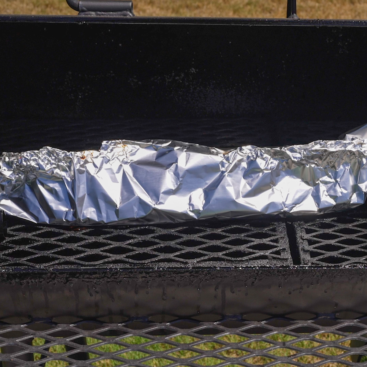 Ribs wrapped in foil.